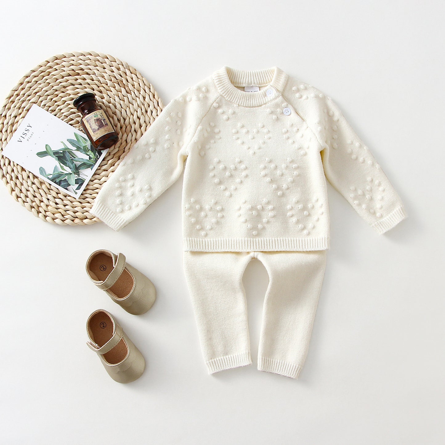 Conjunto de suéter y pantalones de color liso de punto Love para niños
Children's Knitted Love Solid Color Sweater And Pants Set